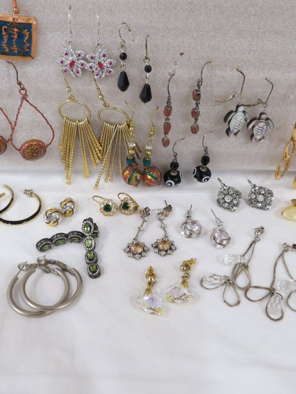 23 pairs of earrings